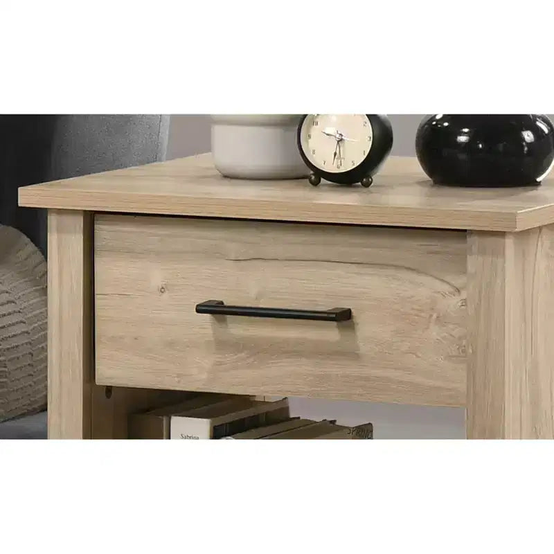 This Celeste 20W Light Oak Finish 1-Drawer Nightstand Bedside Table combines contemporary style with smart storage solutions, creating a space.