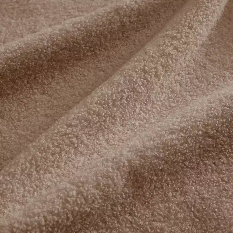 Moderno divano componibile a 2 posti rivestito in tessuto Teddy con cuscini lombari e pouf | Beige / Cammello / Verde / Arancione